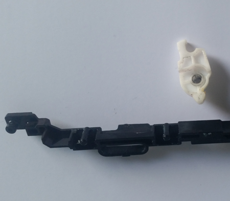 Plastic parts from HP LaserJet 1600, 2600 cartridge lock part